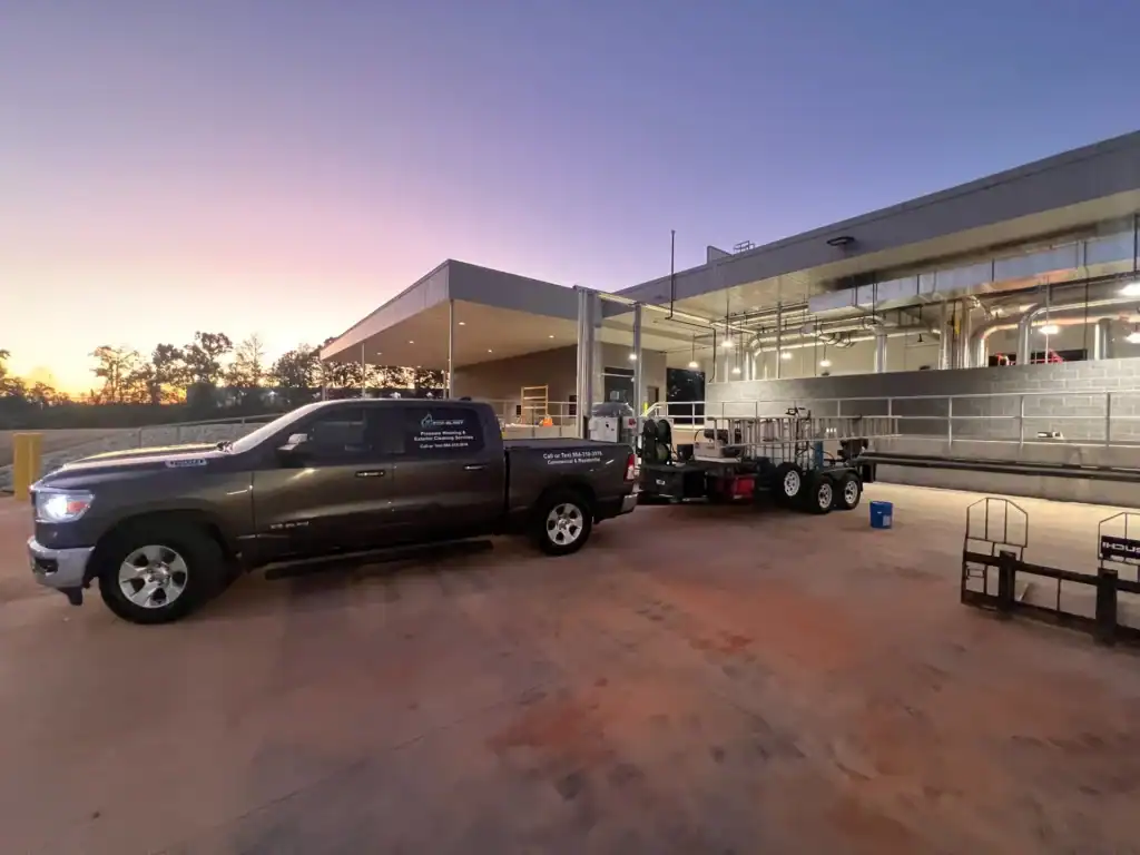 Eco Blast Pressure Washing truck and commercial cleaning equipment at industrial facility in Greenville Spartanburg SC during exterior washing project