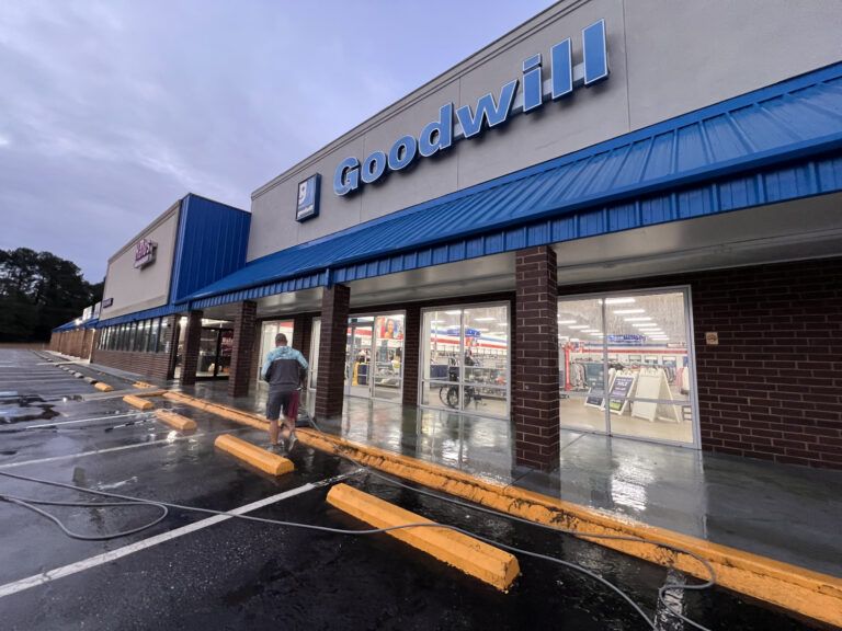 pressure washing crew at Goodwill