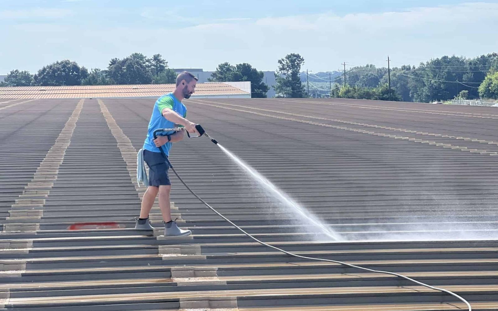Eco Blast cleaning a commercial metal roof